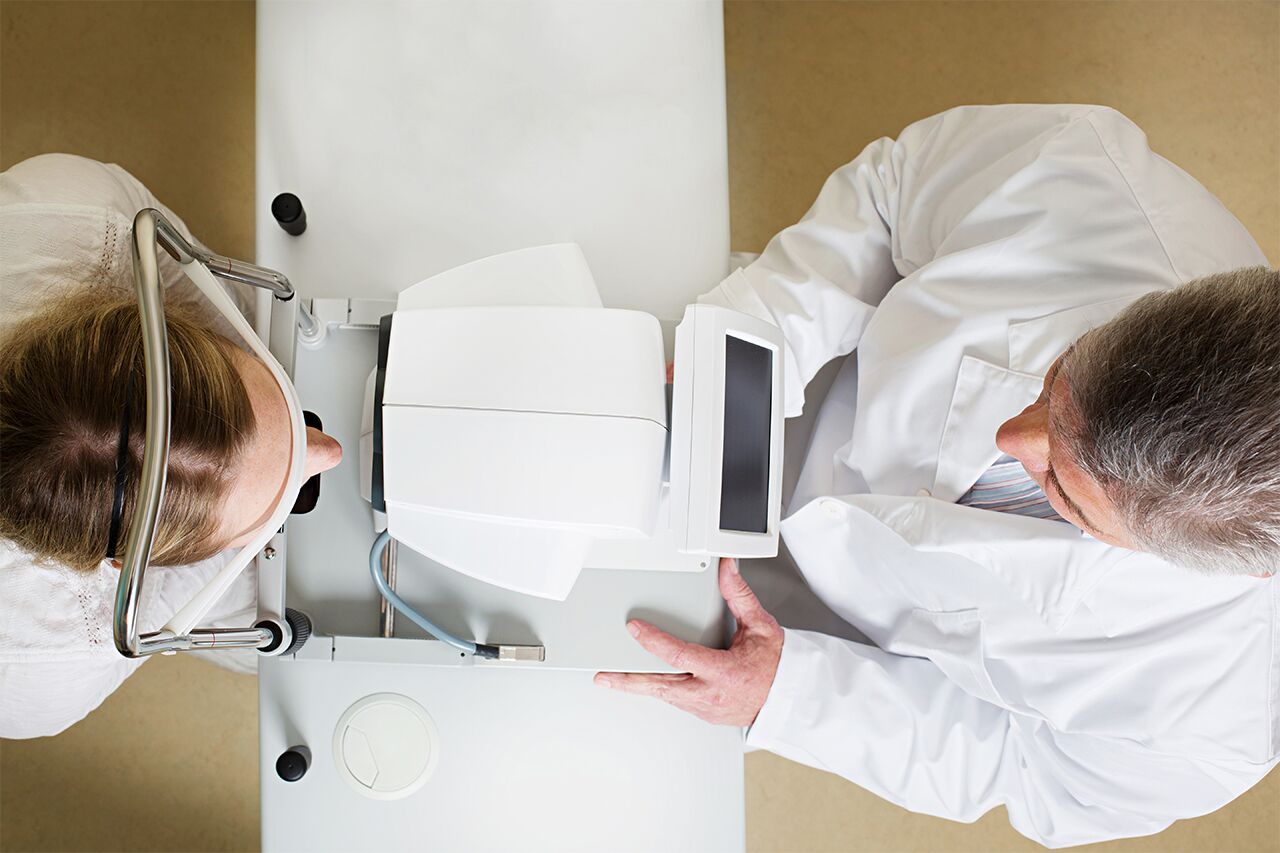 Optometrist performing a comprehensive eye exam